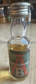 oo286 - original East German miniature alcohol spirits bottle - 4/5 full