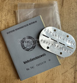 ab318 - NVA WDA Wehrdienstausweis document with dog tag - c1975 Berlin-Mitte - Unteroffizier