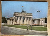ab136 - c1988 set of propaganda photos in folder given to visitors of the Berlin Wall at the Brandenburg gate on the DDR side
