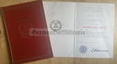 ab177 - c1984 Banner der Arbeit level III award certificate with folder