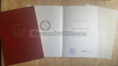 ab178 - c1978 Banner der Arbeit level II award certificate with large size folder & two medal certs for her husband