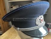 wo389 - original East German TraPo Transportpolizei transport police Officer ranks visor hat - size 56