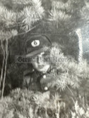 wpc040 - late 1950s NVA soldier with old winter hat & tri-colour cockade in bushes photo