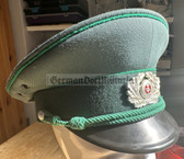 wo556 - original East German Volkspolizei Wachtmeister non-Officer ranks VP VoPo BePo police visor hat - size 57