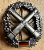 bw037 - West German Army beret badge - Artillery