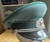 wo618 - original East German Volkspolizei Officer ranks VP VoPo BePo police visor hat - size 56