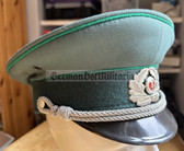 wo253 - original East German Volkspolizei Officer ranks VP VoPo BePo police visor hat - size 57