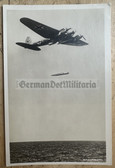 jm073 - Luftwaffe aircraft launches torpedo at sea