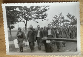 ac370 - laughing Polish Army POW's on march to Berlin photo with Wehrmacht guard