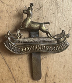 mp011 - original Canadian Army cap badge - Royal Canadian Dragoons