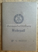 ac416 - NVA Wehrpass issued in 1964 -  WDA Wehrdienstausweis document - Unteroffizier with 1958 service in Prora - Artillery