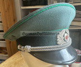 wo097 - original East German Volkspolizei Officer ranks VP VoPo BePo police visor hat - size 57