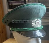 wo082 - original East German Volkspolizei Wachtmeister non-Officer ranks VP VoPo BePo police visor hat - size 56