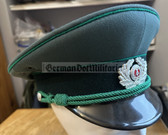 wo067 - original East German Volkspolizei Wachtmeister non-Officer ranks VP VoPo BePo police visor hat - size 57