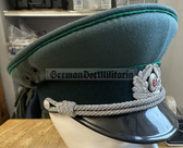 wo089 - original East German Volkspolizei Officer ranks VP VoPo BePo police visor hat - size 56