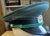 wo244 - original East German Volkspolizei Wachtmeister non-Officer ranks VP VoPo BePo police visor hat - size 57