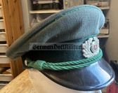 wo245 - original East German Volkspolizei Wachtmeister non-Officer ranks VP VoPo BePo police visor hat - size 55