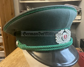wo158 - original East German Volkspolizei Wachtmeister non-Officer ranks VP VoPo BePo police visor hat - size 56