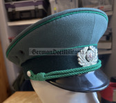 wo447 - original East German Volkspolizei Wachtmeister non-Officer ranks VP VoPo BePo police visor hat - size 57