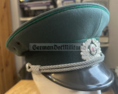 wo167 - original East German Volkspolizei Officer ranks VP VoPo BePo police visor hat - size 57