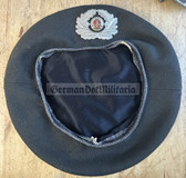 ft026 -  female Grenztruppen, NVA & Stasi beret with metallic badge - size 53