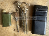 wo115 - East German weapons cleaning kit in tin box - Makarov, Kalashnikov
