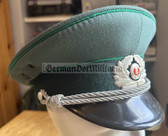 wo159 - original East German Volkspolizei Officer ranks VP VoPo BePo police visor hat - size 57