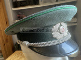 wo141 - c1971 dated East German Volkspolizei Officer ranks VP VoPo BePo police visor hat - size 54