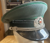 wo164 - original East German Volkspolizei Officer ranks VP VoPo BePo police visor hat - size 57