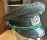 wo183 - original East German Volkspolizei Wachtmeister ranks VP VoPo BePo police visor hat - size 55
