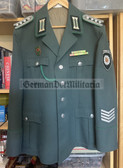 wo183 - VP Volkspolizei VoPo police Service Uniform Jacket with 10-place ribbon bar, Schutzpolizei arm patch, service chevrons, whistle and other awards - Obermeister rank - size m52-1