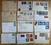 od055 - lot of DDR stamped letter envelopes & postcards posted to West Germany