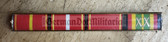 is058 - 4 place paper medal ribbon bar for wear on shirts - NVA or Stasi - senior NCO rank or senior Officer rank