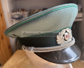 wo167 - East German Volkspolizei Officer ranks VP VoPo BePo police visor hat - size 56