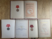gw101 - lot of medal award certs with folders for the same man - Kampfgruppen