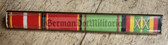 is062 - 4 place paper medal ribbon bar for wear on shirts - NVA or Stasi or Grenztruppen Border Guards - senior Officer rank