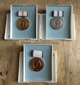 om474 - complete of DDR Health Service long service medals in boxes