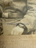 ad160 - German WW1 soldier studio portrait photo with medal ribbon bar and military wrist watch or compass - on cardboard