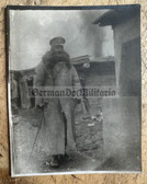 ad240 - c1917 German WW1 officer with greatcoat in trench photo