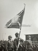ad335 - Luftwaffe unit parade photo with unit flag and flag carrier patch