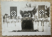 ad352 - BDM female HJ meeting in traditional dress and flags photo