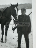 wpc083 - Wehrmacht troop with horse drawn carriages in winter photo