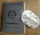 wd007 - NVA WDA Wehrdienstausweis document with dog tag - served as an Unteroffizier in the 1960s - Chemical troops - c1974 Strausberg