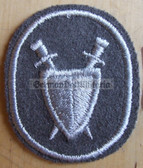 om093 - 3 - NVA Army Military Justice Troops qualification sleeve patch - for Fähnrich ranks only with white border - aa0