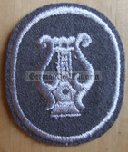 om098 - NVA Army Military Musician qualification sleeve patch - for Fähnrich ranks only with white border