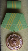 om917 - 11 - VOLKSPOLIZEI VP - long service medal in Gold for 15 years service with State Crest - East German Police Service - aa0x3