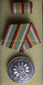 om920 - 7 - VOLKSPOLIZEI VP - FUER HERVORRAGENDE VERDIENSTE in Silver - East German Police Service medal - rp0