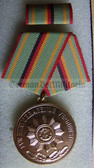 om936 - VOLKSPOLIZEI VP - FUER HERVORRAGENDE VERDIENSTE in Gold - East German Police Service medal