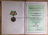 od040 - c1974 VP Volkspolizei Police medal cert