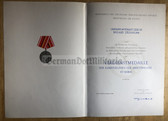 od044 - c1976 dated Kampfgruppen award cert to a VP Oberstleutnant